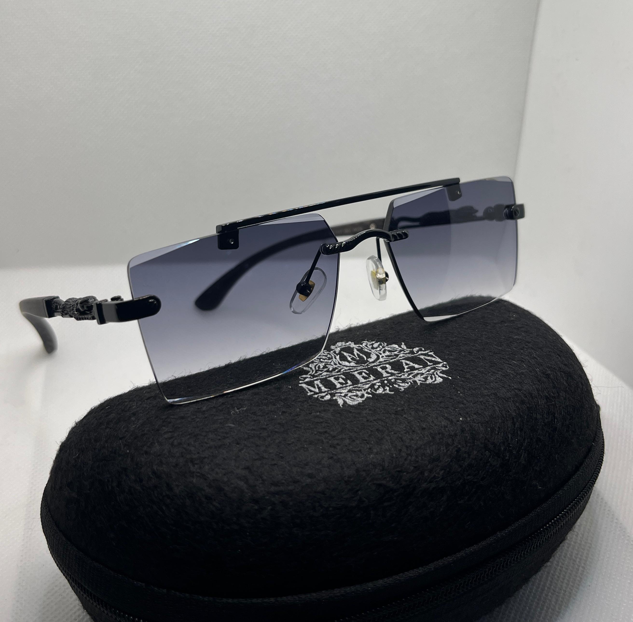 Meeran panther sunglasses with blue lenses and a black/black frame, featuring UV protection
